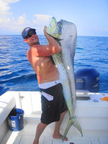 Man holding a Mahi-Mahi in Los Suenos