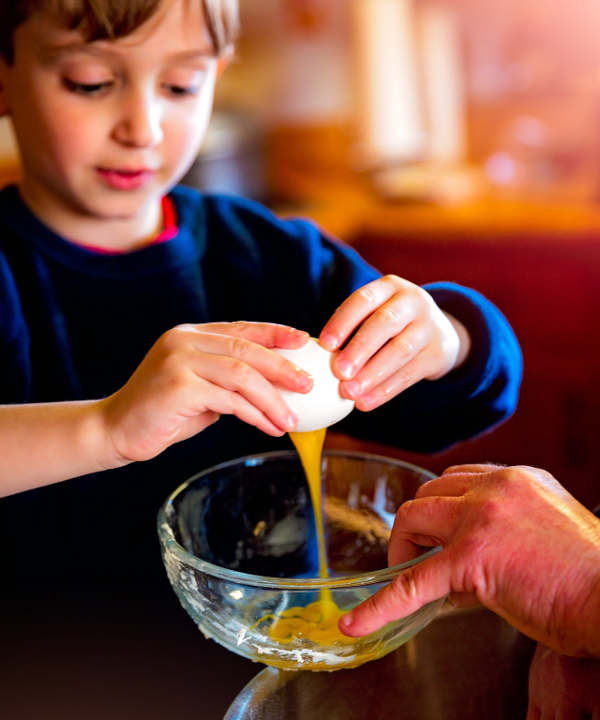 Kid baking with parent